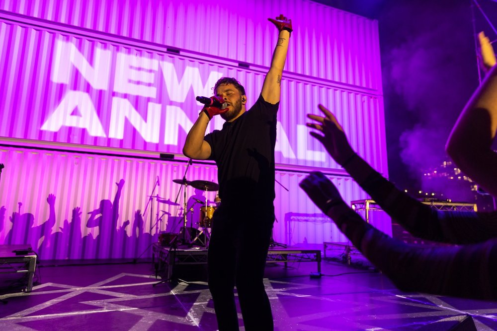 A singer on stage at New Annual festival 2022