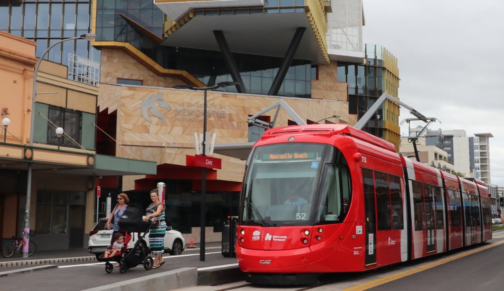 The lightrail tram in front of a stop on Hunter Street in Newcastle