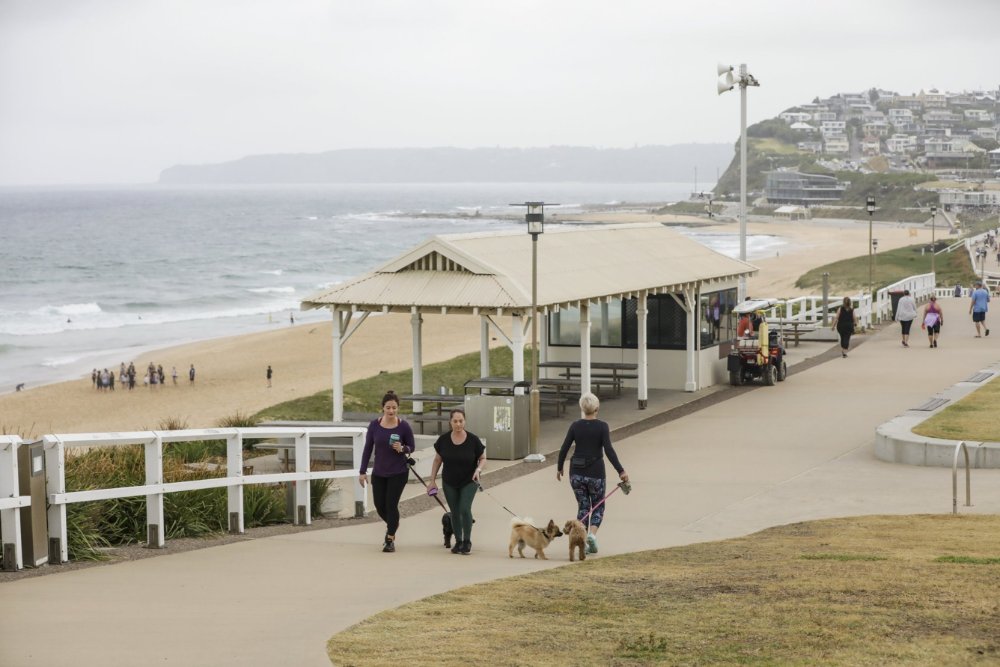 people walking along the bathers way trail