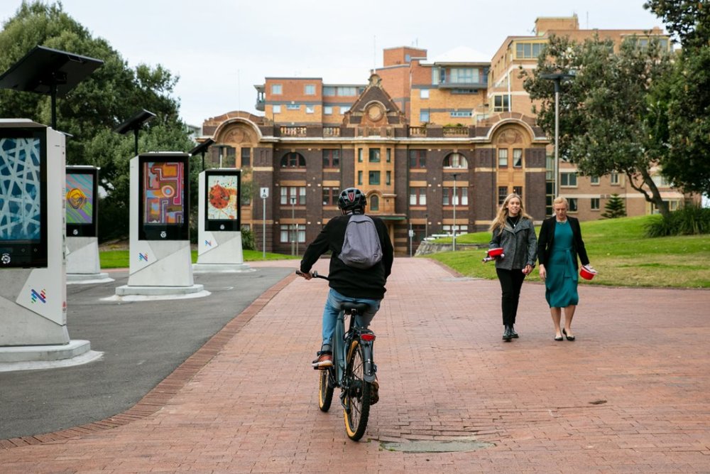 Cyclist and walker in the East End