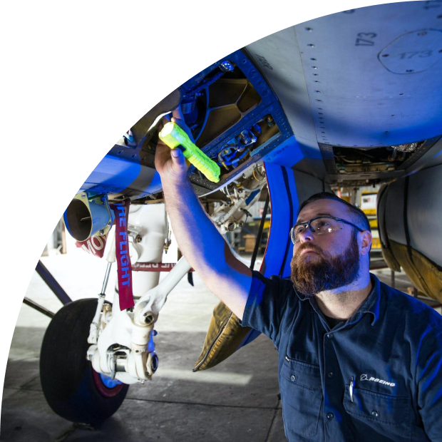 A Boeing engineer inspecting an aircraft