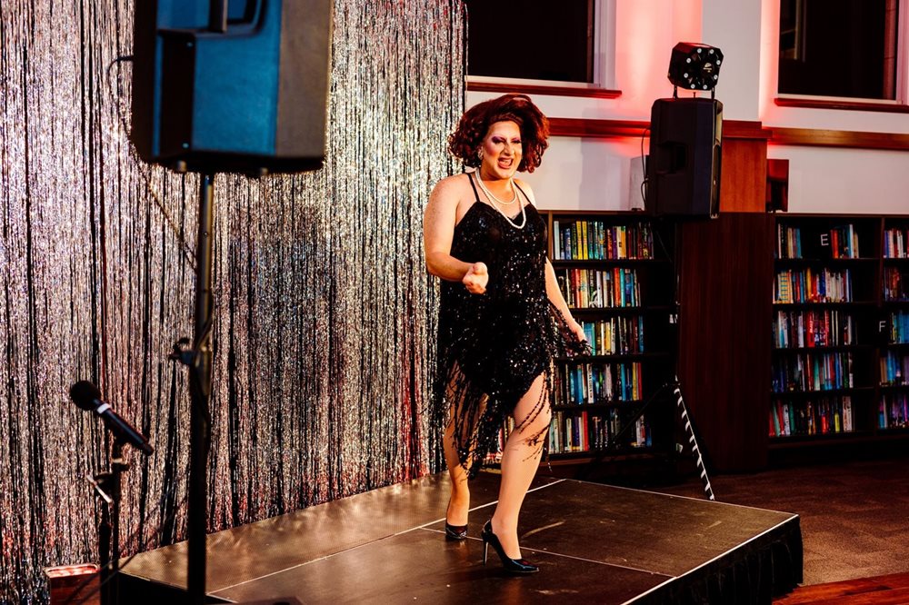 A drag queen performs at a Library event