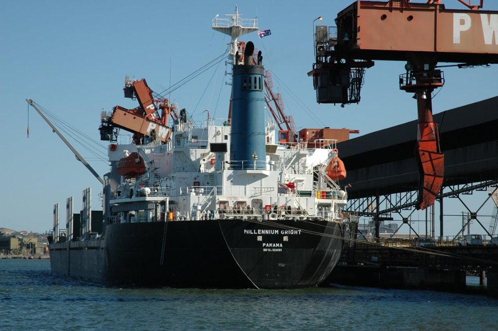 Cargo loading on a large ship at Newcastle Port