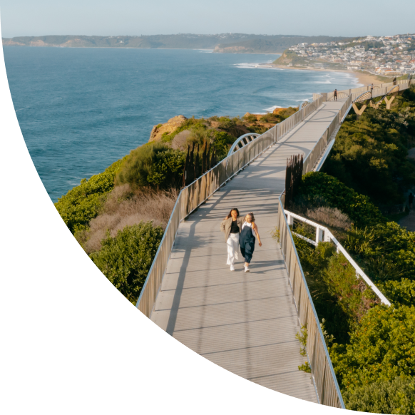 Two people walking on the Anzac walk