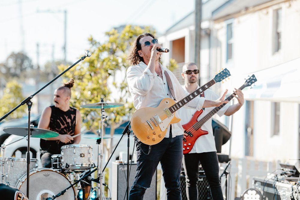 A band playing outside on Darby street