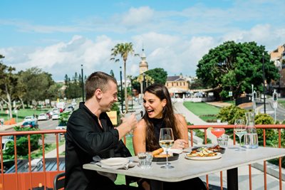 A couple dining outside in Newcastle's civic precinct