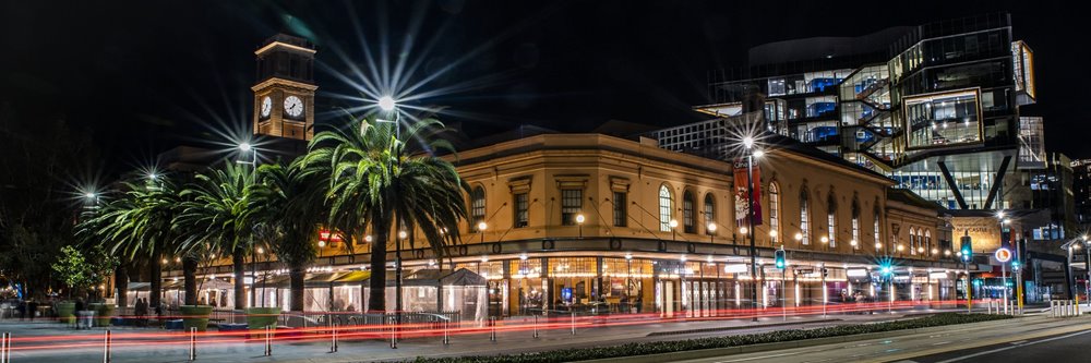 A night image of the Civic Theatre and the University of Newcastle NU building